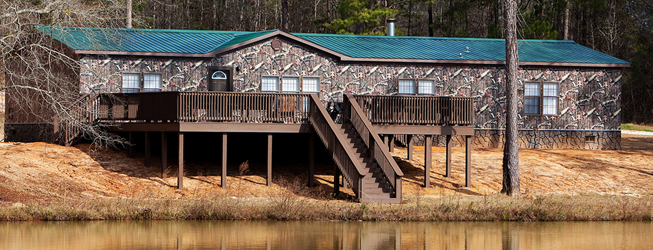 Kid Rock's hunting cabin wrapped in Mossy Oak Graphics